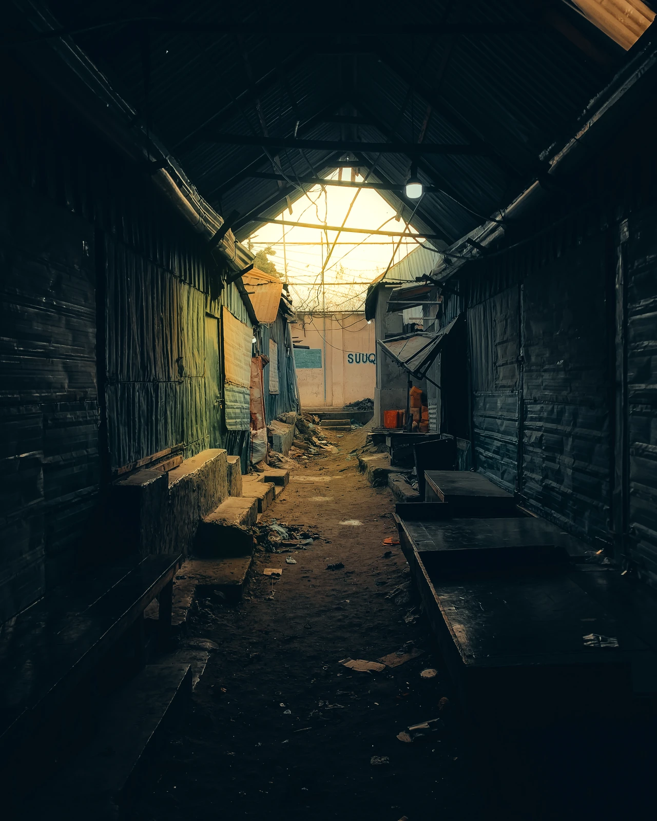 Warm sunlight entering a covered market passage at Suuqa Beerta.